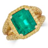 A COLOMBIAN EMERALD AND YELLOW DIAMOND RING set with a step cut emerald of approximately 5.50ct, the