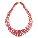 A PINK TOURMALINE BEAD NECKLACE comprising of four strands of polished graduated tourmaline beads,