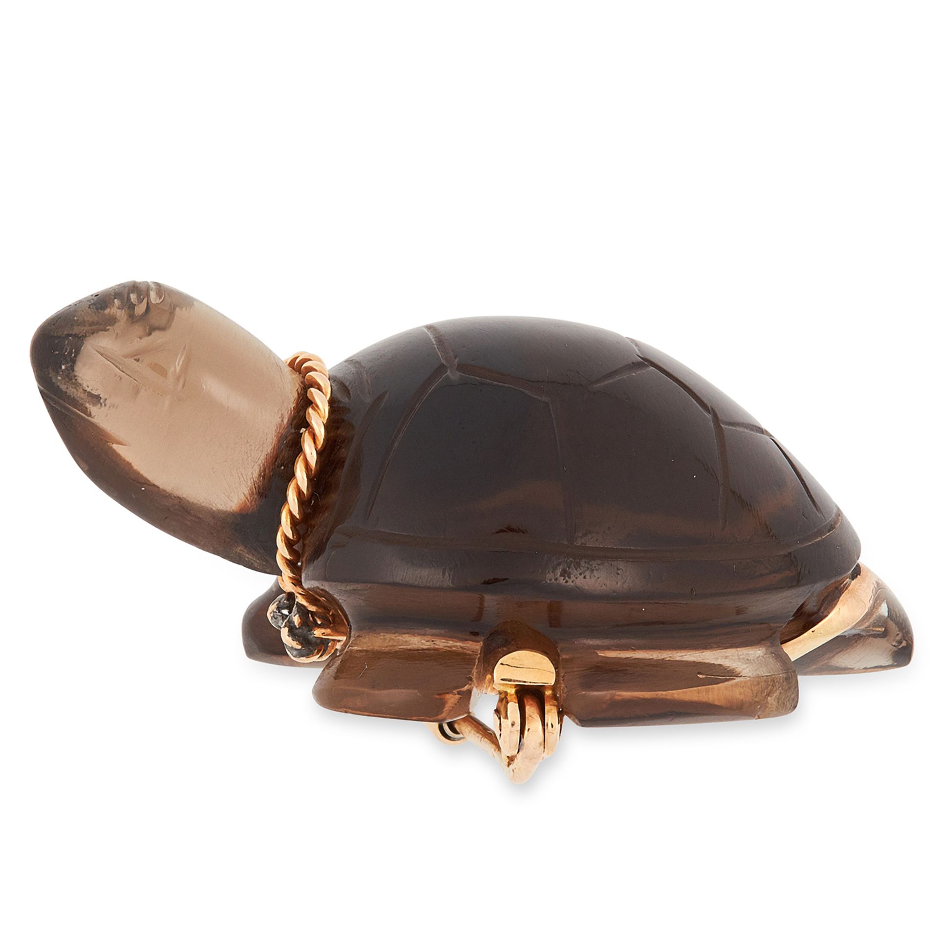 A SMOKEY QUARTZ TURTLE BROOCH comprising of a sea turtle carved from smokey quartz with gold mounts,