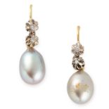 A PAIR OF PEARL AND DIAMOND EARRINGS the articulated bodies of each set with round cut diamonds