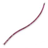 A RUBY LINE BRACELET set with approximately 14.00 carats of step cut rubies, 18 cm, 42.3g.