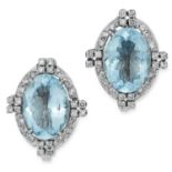 A PAIR OF AQUAMARINE AND DIAMOND EARRINGS in Art Deco design, each set with an oval cut aquamarine