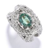 AN ALEXANDRITE AND DIAMOND RING set with an oval cut alexandrite of 1.60 carats within an openwork