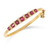 ANTIQUE RUBY AND DIAMOND BANGLE set with cushion cut rubies and old cut diamonds, inner diameter: