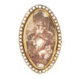 AN ANTIQUE MINIATURE AND PEARL MOURNING RING depicting a mourning mother and child with dog, in a