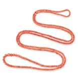 AN ANTIQUE CORAL BEAD NECKLACE comprising of a single row of polished coral beads up to 8.5mm,