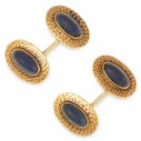 ANTIQUE SAPPHIRE CUFFLINKS set with cabochon sapphires in a gold border, 1.5cm, 9.9g.