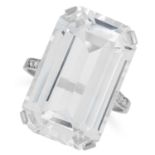 A WHITE ZIRCON AND DIAMOND RING set with an emerald cut white zircon of 18.37 carats, accented by