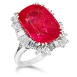 A BURMA NO HEAT RUBY AND DIAMOND RING set with a cushion cut ruby of 14.67 carats encircled by a