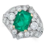 A COLOMBIAN EMERALD AND DIAMOND DRESS RING set with an emerald cut emerald of approximately 4.20