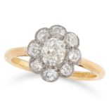 AN ANTIQUE DIAMOND CLUSTER RING set with a principal old cut diamond of 0.77 carats encircled by