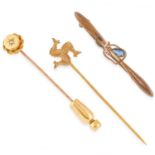 THREE GEMSET TIE PINS set with a rose cut diamond and a pear cut sapphire, 4.6g total weight.