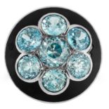 A BLUE ZIRCON AND ENAMEL DRESS RING the circular bombe face jewelled with a cluster of seven round