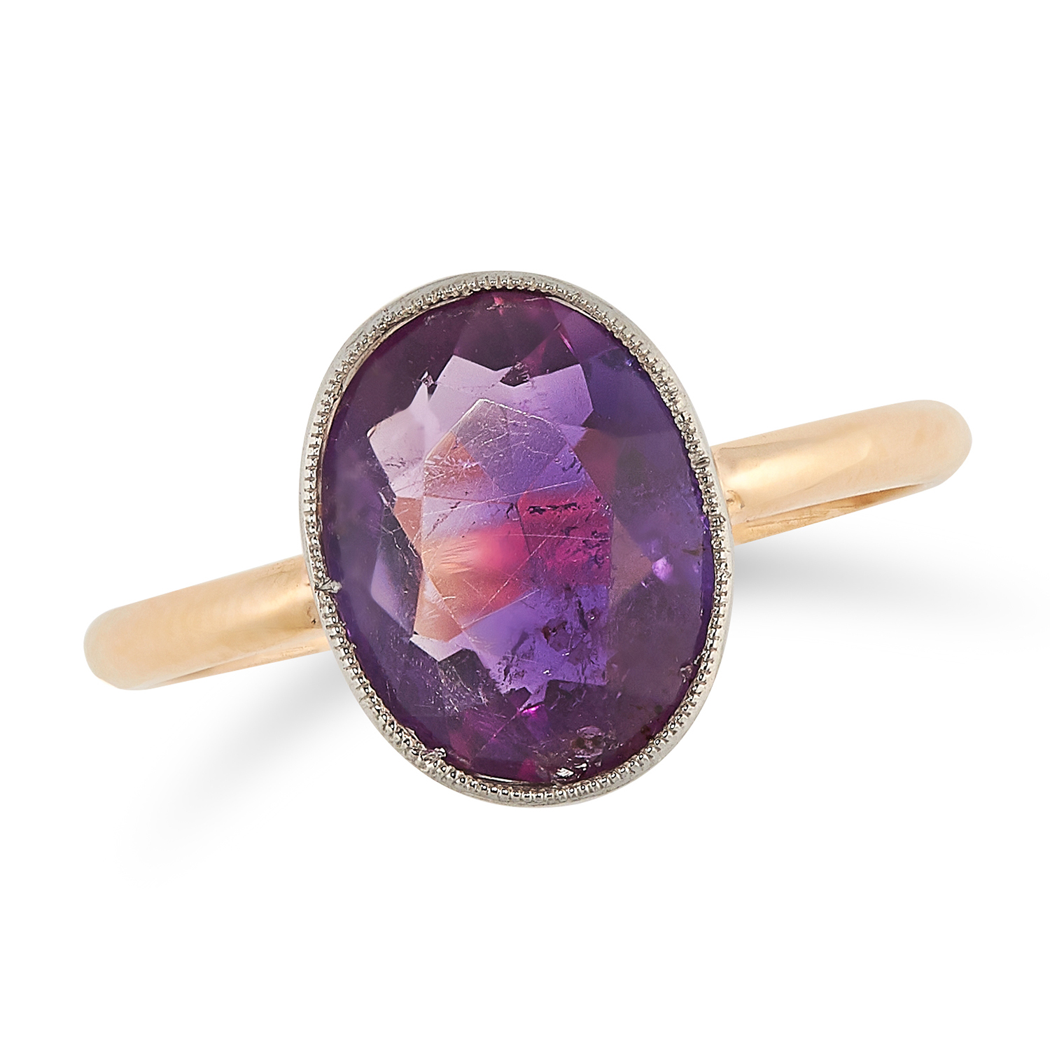 AN AMETHYST RING set with an oval cut amethyst to a plain band, size O / 7, 2.5g.