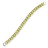 PERIDOT LINE BRACELET set with two rows of oval cut peridot, 17cm, 19.3g.