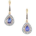 A PAIR OF TANZANITE AND DIAMOND CLUSTER EARRINGS each set with a pear cut tanzanite in a cluster