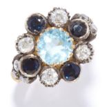 AQUAMARINE, SAPPHIRE AND DIAMOND CLUSTER RING set with a round cut aquamarine in a cluster of