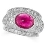 A PINK TOURMALINE AND DIAMOND RING set with an oval cut pink tourmaline in a surround of round cut