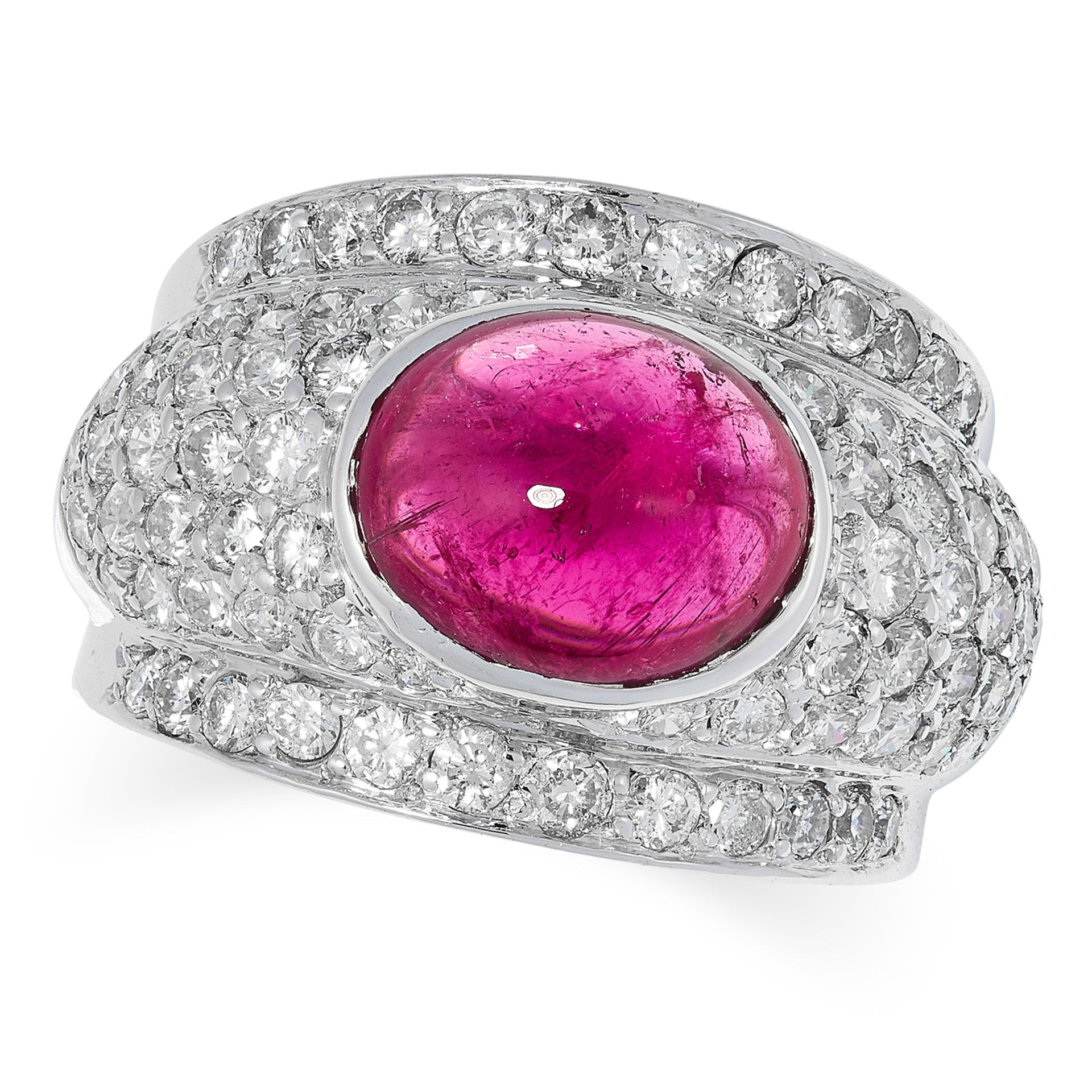 A PINK TOURMALINE AND DIAMOND RING set with an oval cut pink tourmaline in a surround of round cut