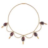 AN ANTIQUE GARNET DROP MOURNING NECKLACE, 19TH CENTURY set with cabochon garnets, gold tassel