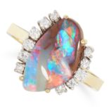 A BOULDER OPAL AND DIAMOND RING set with a central boulder opal in an open cluster of diamonds, size