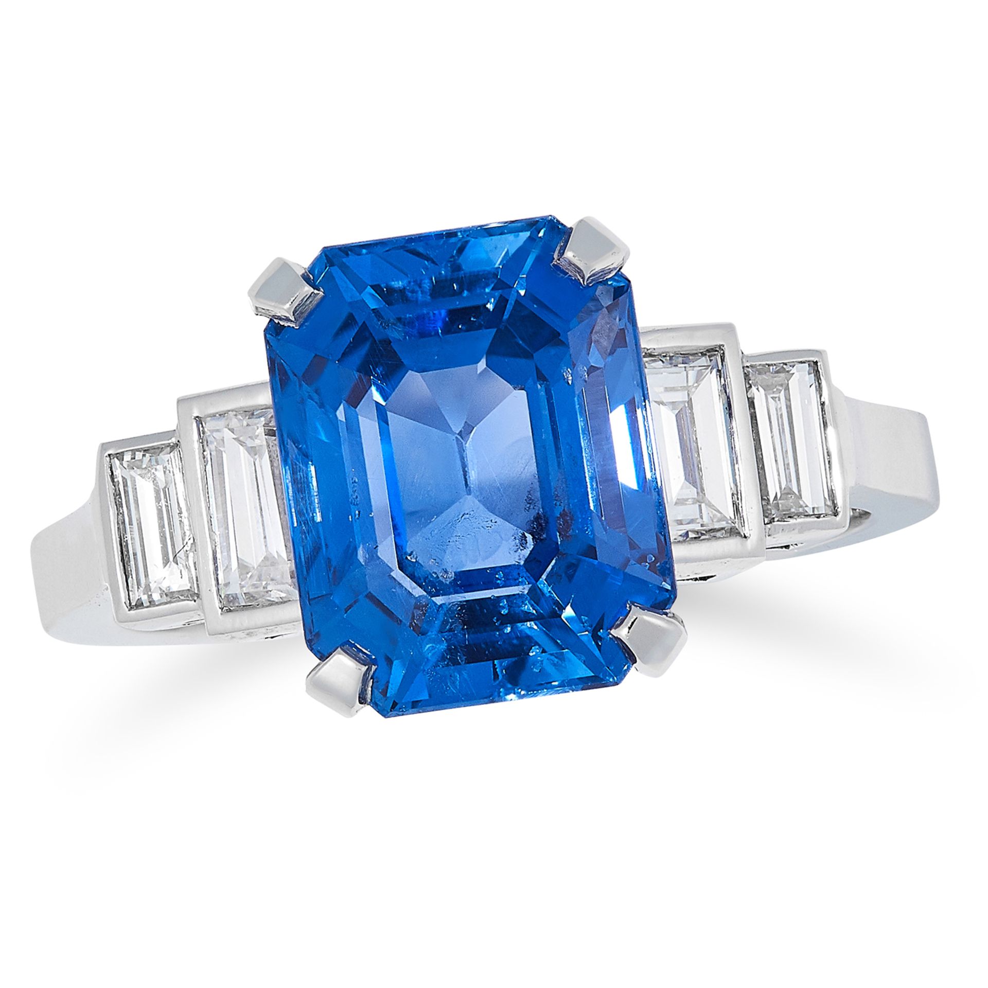 A 5.36 CARAT CEYLON NO HEAT SAPPHIRE AND DIAMOND RING set with an emerald cut sapphire of 5.36