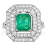 AN EMERALD AND DIAMOND DRESS RING the emerald cut emerald in two halos of round cut diamonds,