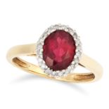 GARNET AND DIAMOND CLUSTER RING set with an oval cut garnet in a halo of round cut diamonds, size
