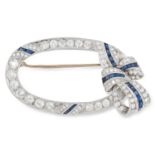 AN ANTIQUE DIAMOND AND SAPPHIRE BROOCH designed as an open oval with a ribbon and bow motif, set