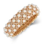 A DIAMOND AND PEARL MATELASSE BRACELET, CHANEL designed as an openwork lattice set with pearls and