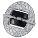 AN ONYX AND DIAMOND RING, CHANEL set with polished onyx and round cut diamonds, signed Chanel and