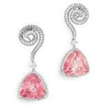 A PAIR OF PINK TOPAZ AND DIAMOND EARRINGS each set with a triangular brilliant cut topaz encircled