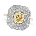 A FANCY YELLOW DIAMOND AND DIAMOND CLUSTER RING set with a fancy yellow cushion cut diamond of 1.