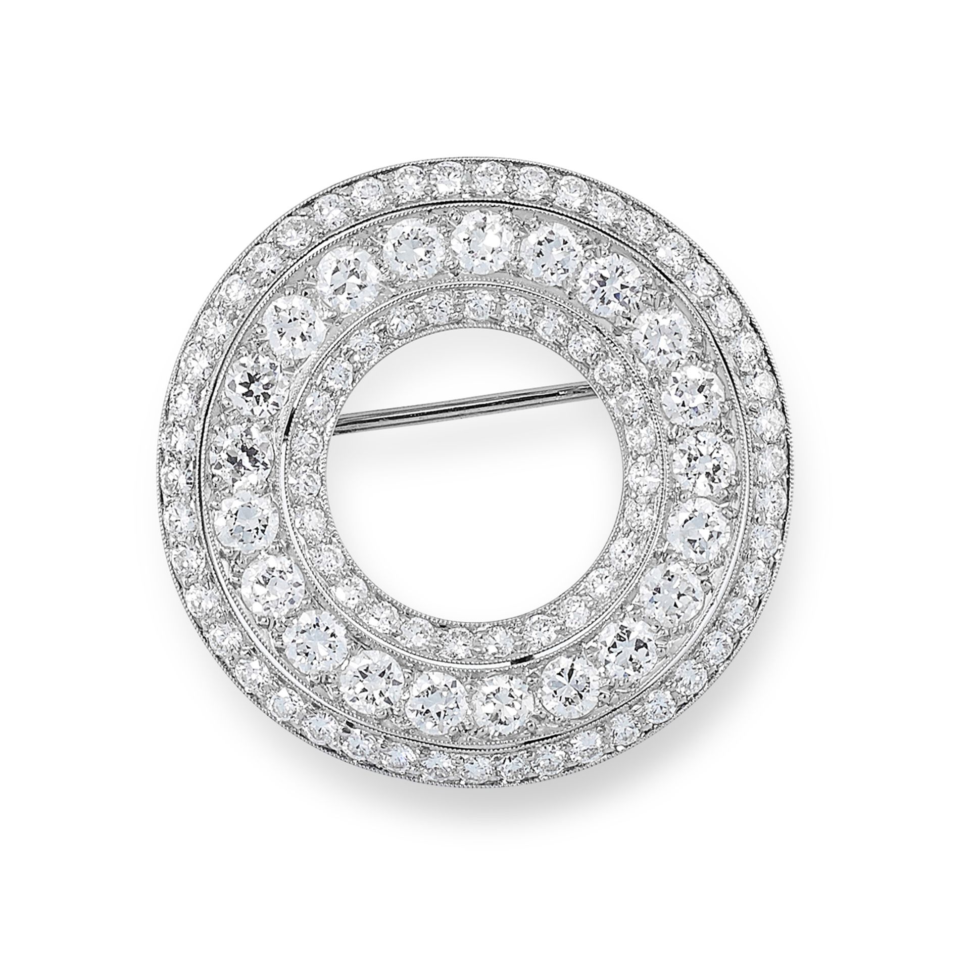 A DIAMOND BROOCH, CARTIER designed as an open circle with three rows of round cut diamonds, signed