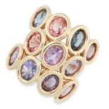 A SPINEL DRESS RING set with multicoloured oval cut spinel, size H / 4.5, 12.6g. Accompanied by a
