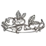 AN ANTIQUE DIAMOND TIARA the foliate design set with three principal old cut diamonds of 1.48, 1.