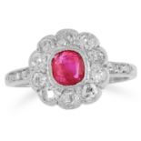 RUBY AND DIAMOND CLUSTER RING set with a cushion cut ruby in a cluster of old cut diamonds, size M /