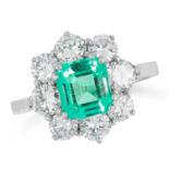 A COLOMBIAN EMERALD AND DIAMOND CLUSTER RING set with an emerald of 1.61 carats in a cluster of