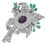 AN AMETHYST, EMERALD AND DIAMOND BROOCH designed as a flower set with a central oval cut amethyst,