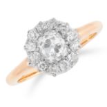 DIAMOND CLUSTER RING set with a central old cut diamond of 0.98 carats, encircled by further