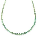 JADE BEAD NECKLACE comprising of a single strand of polished jade beads, 76cm, 58.5g.