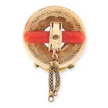 ANTIQUE CORAL TASSEL CLIP in Etruscan revival style, in circular design set with a bar of coral