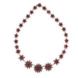 AN ANTIQUE GARNET NECKLACE, 19TH CENTURY comprising of floral links set with rose cut garnets, 38cm,