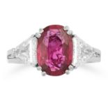 A RUBY AND DIAMOND THREE STONE RING set with an oval cut ruby between two trillion cut diamonds,