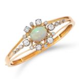 ANTIQUE OPAL AND DIAMOND BANGLE set with a cabochon opal in a border of old cut diamonds, 6cm