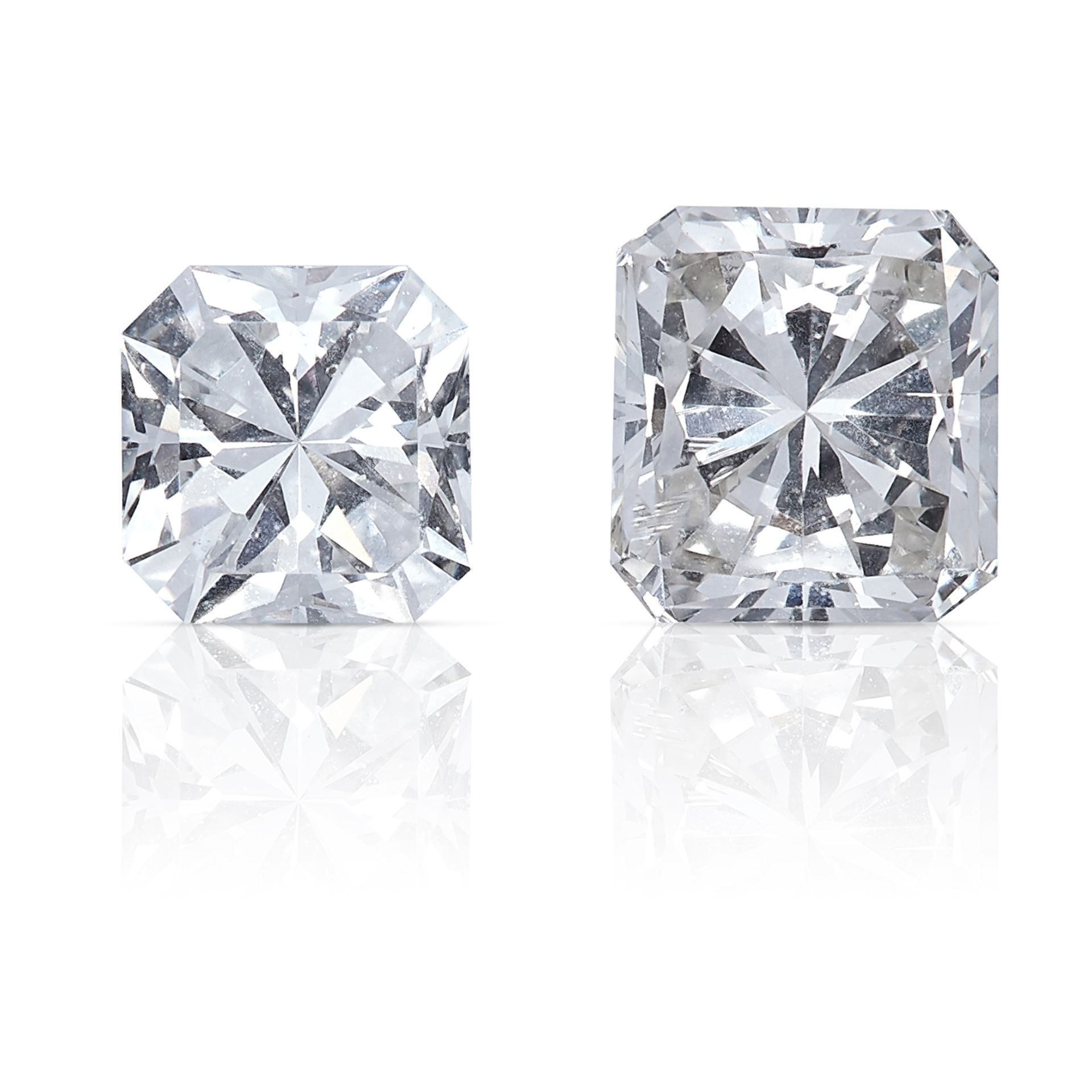 TWO SQUARE MODIFIED BRILLIANT CUT DIAMONDS, TOTALLING 0.71cts, UNMOUNTED.