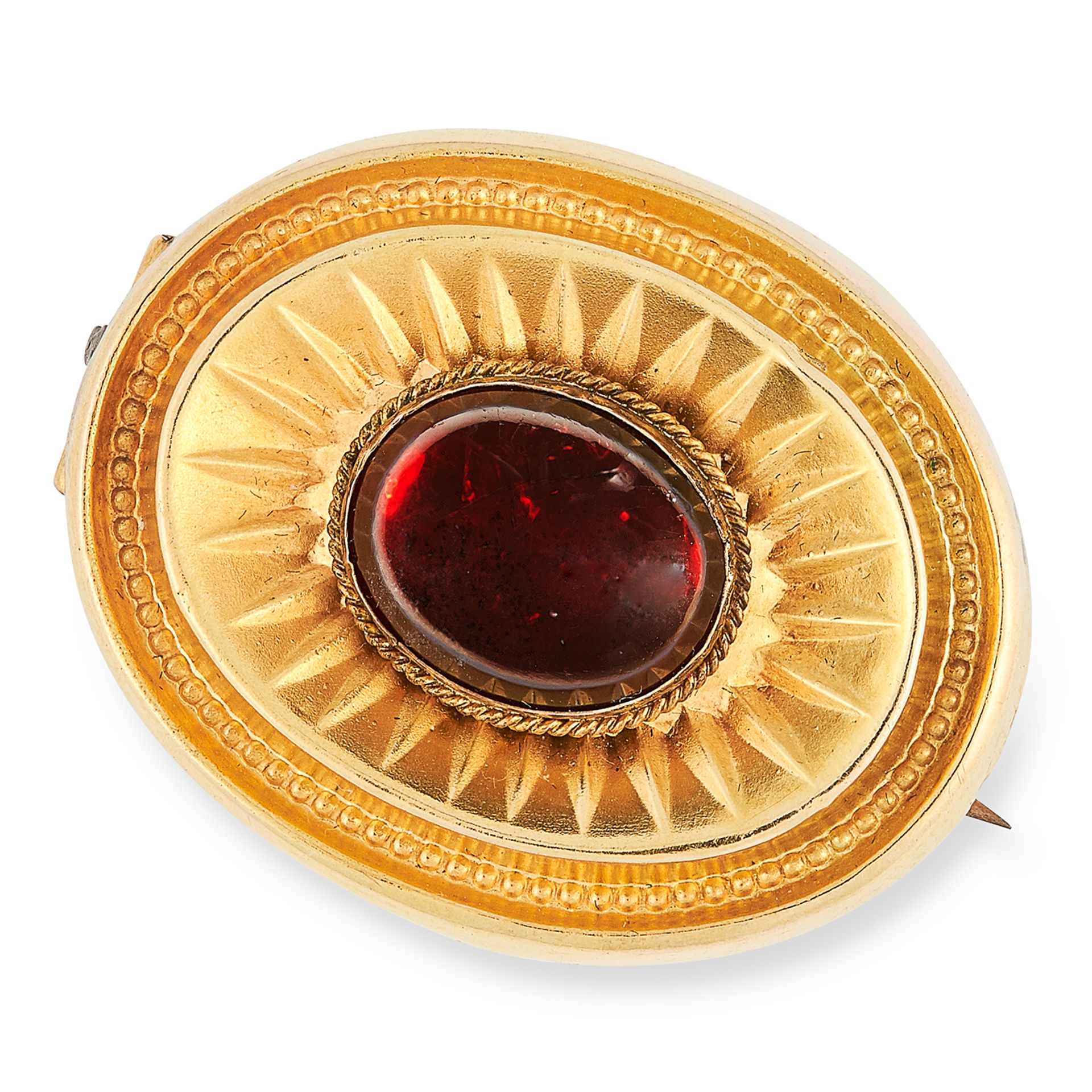 ANTIQUE VICTORIAN GARNET BROOCH set with a cabochon garnet, with glass locket back, 3cm, 7.2g.