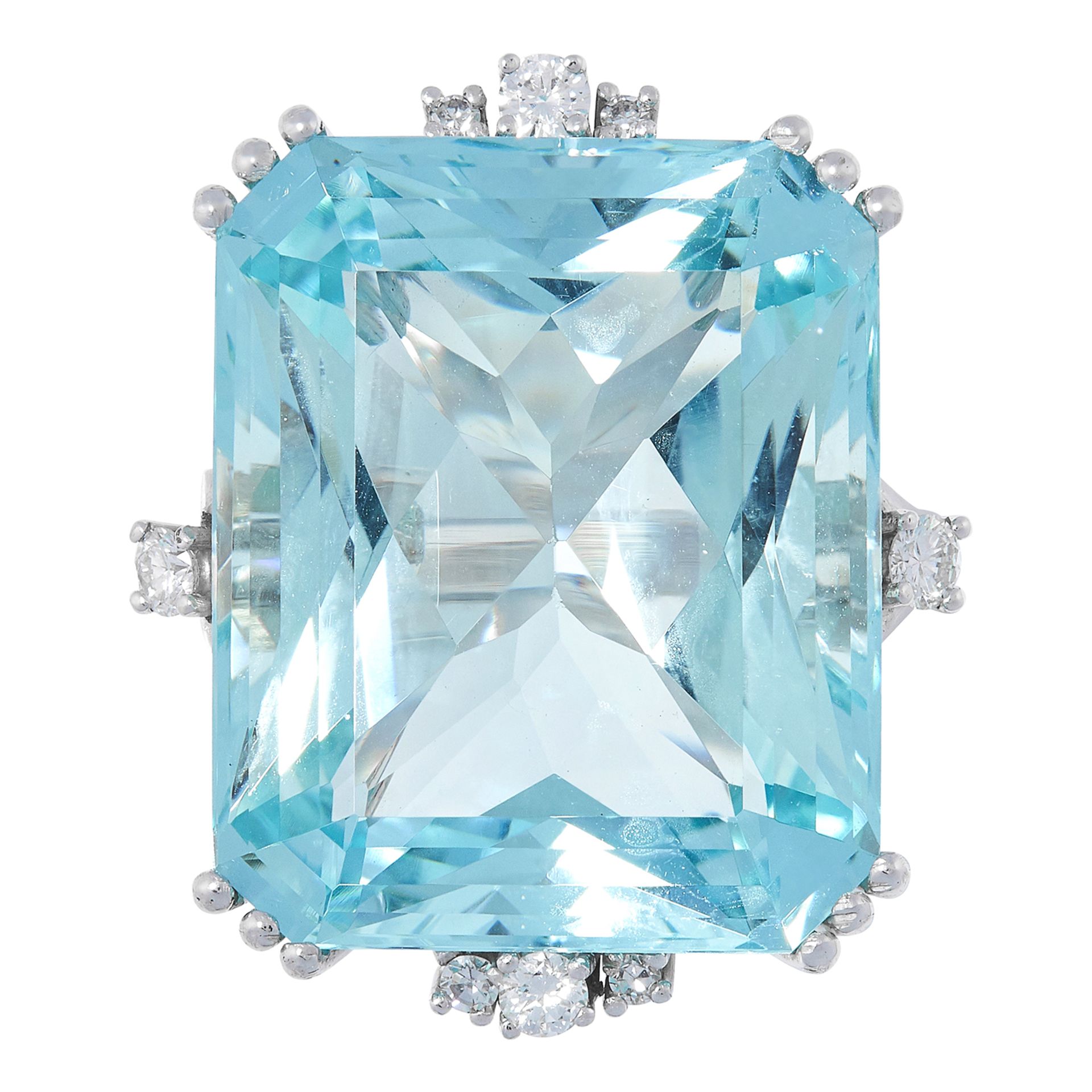 AQUAMARINE AND DIAMOND RING set with an emerald cut aquamarine of approximately 26.00 carats and