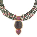 A VINTAGE RUBY AND TOURMALINE BEAD NECKLACE, EILEEN COYNE suspending a pendant set with polished