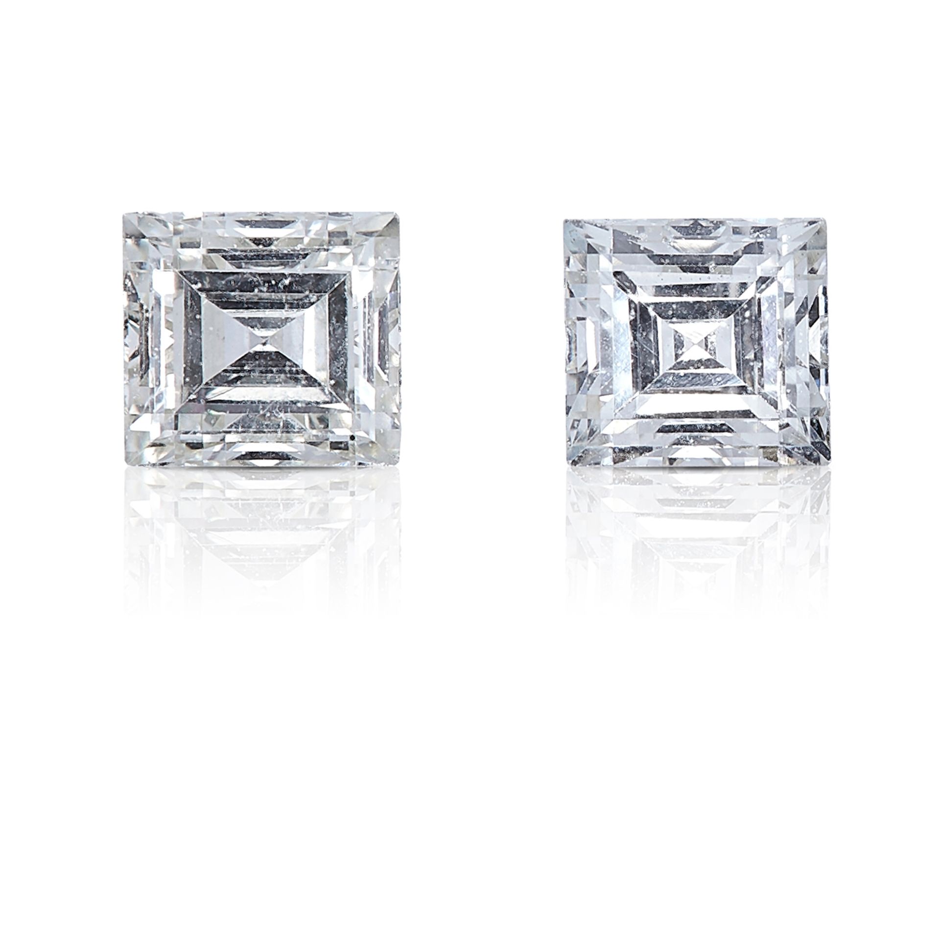 A PAIR OF STEP CUT DIAMONDS, TOTALLING 0.34cts, UNMOUNTED.